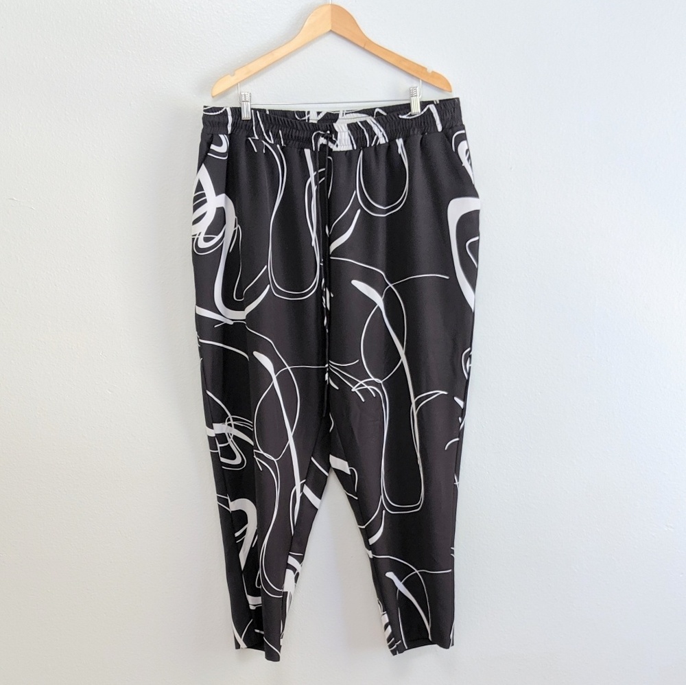 Eloquii Black Swirl Pattern Pants. Size 24